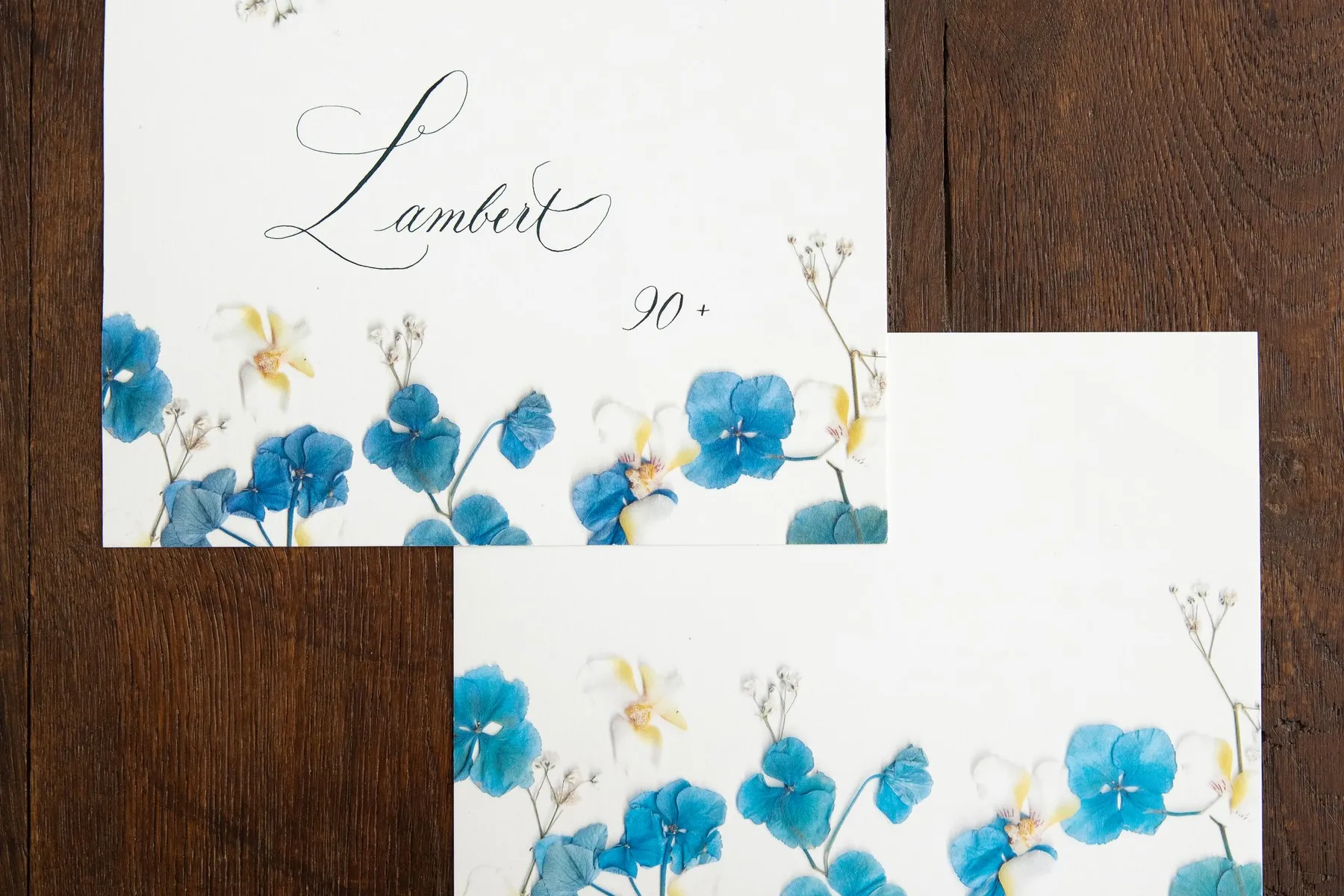 Finished Pétalia botanical cards with copperplate calligraphy